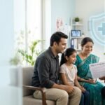 Create a premium, photorealistic editorial hero image for a personal finance and healthcare website article titled “What Is Health Insurance and How It Works?” **Scene:** An Indian family consisting of two parents and one child sitting comfortably with a friendly Indian doctor in a modern hospital consultation room. The doctor is explaining a health insurance document to the family. Include a subtle visual representation of financial protection, such as a translucent blue shield enclosing a simple medical cross and a small heart symbol. **Composition:** Wide 16:9 landscape layout, family and doctor positioned toward the right half, clean negative space on the left for a website headline. Balanced composition suitable for a professional blog featured image. **Visual style:** Photorealistic commercial healthcare photography, natural expressions, realistic Indian features, professional and reassuring atmosphere, soft daylight, crisp details, realistic skin tones, premium editorial art direction. **Color palette:** Healthcare blue (#0B4EA2), white (#FFFFFF), light cyan (#EAF6FF), and subtle teal accents. Bright, uncluttered background with soft natural shadows. **SEO and design requirements:** No text, no typography, no logos, no watermarks, no visible personal information, no exaggerated medical imagery. Ensure the subject remains recognizable when cropped into a website thumbnail. what is health insurance and how it works